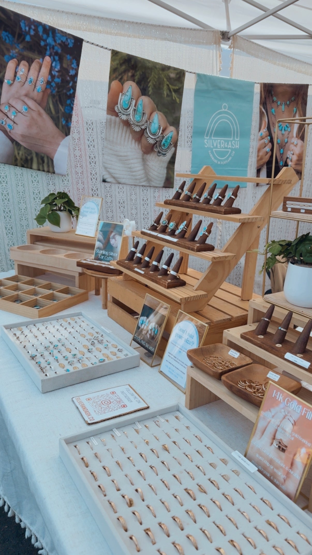 Stall with jewelry display at an outdoor event